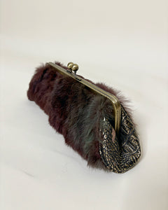 Furry clutch with kiss lock