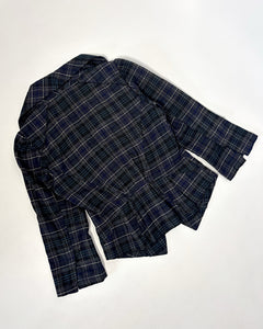 Plaid asymmetric peplum top