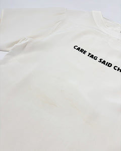 “Care tag said chaos” Upcycled stained silk boxy tee