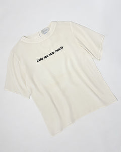 “Care tag said chaos” Upcycled stained silk boxy tee