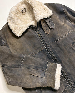 Worn grey shearling jacket