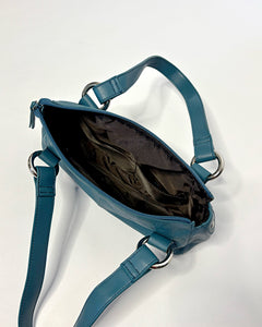 Turquoise leather baguette bag