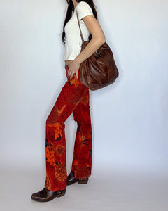Trippy red bootcut corduroy pants