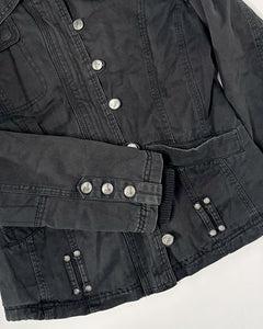 Layered faded black fitted jacket with asymmetric buttoning
