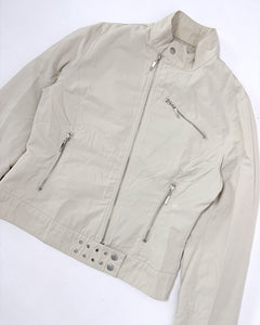 Beige fitted jacket with silver grommets studs