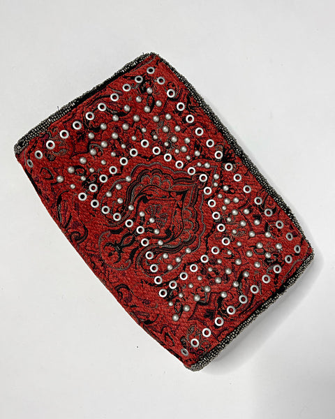 Studded oriental rug clutch bag