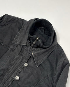 Layered faded black fitted jacket with asymmetric buttoning