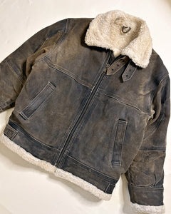 Worn grey shearling jacket