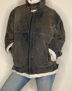 Worn grey shearling jacket