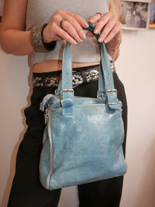 Turquoise side zipper leather bag