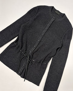 Fitted wool cardigan with leather bows