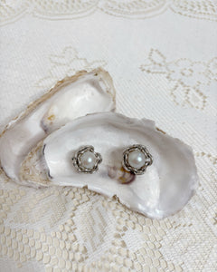 Chained pearl clip earrings