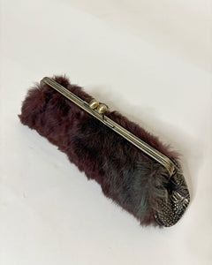 Furry clutch with kiss lock