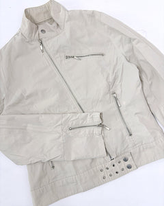 Beige fitted jacket with silver grommets studs