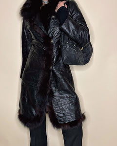 Wrinkled leather coat with fur trimming