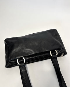 Sleek 90’s minimalism leather bag with silver metal hoops