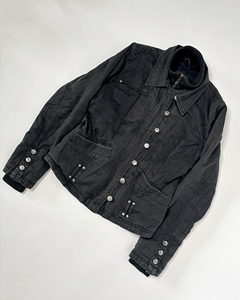 Layered faded black fitted jacket with asymmetric buttoning