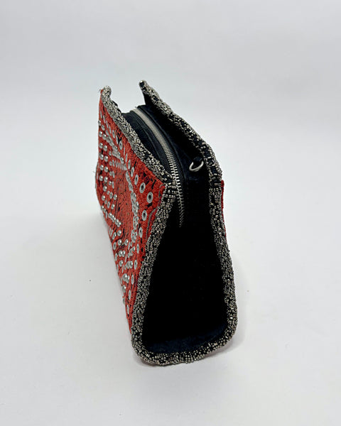 Studded oriental rug clutch bag