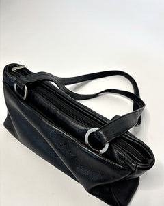Sleek 90’s minimalism leather bag with silver metal hoops