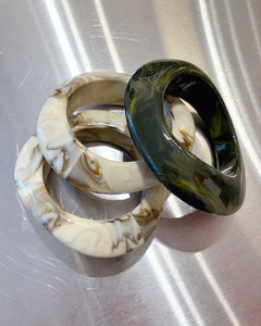 Chunky marble bangle stack