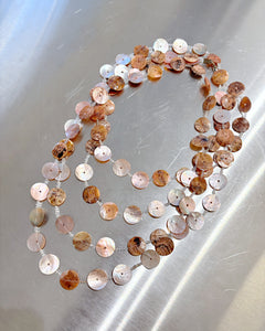 Cascading mother of pearl button necklace