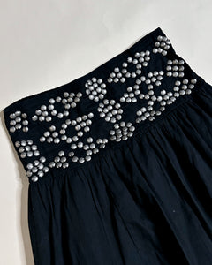 Studded dropped waist asymmetric skirt