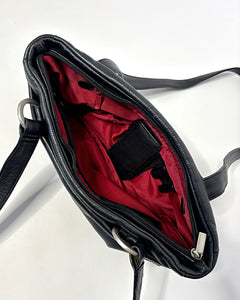 Sleek 90’s minimalism leather bag with silver metal hoops