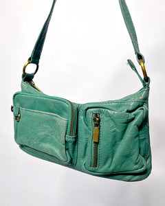 Turquoise leather utility pocket baguette bag