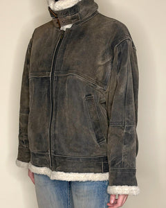 Worn grey shearling jacket