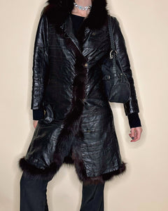 Wrinkled leather coat with fur trimming