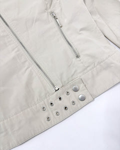 Beige fitted jacket with silver grommets studs