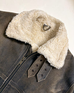 Worn grey shearling jacket