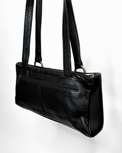 Sleek 90’s minimalism leather bag with silver metal hoops
