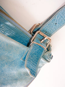 Turquoise side zipper leather bag