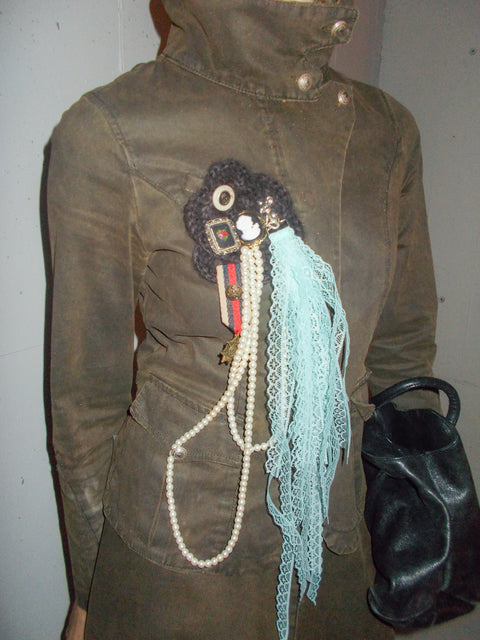 Assorted pins, pearls and lace ribbon knit brooches