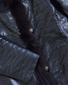 Wrinkled leather coat with fur trimming