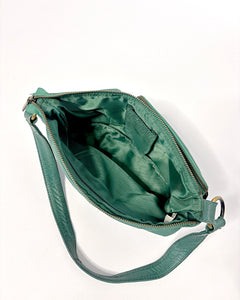 Turquoise leather utility pocket baguette bag