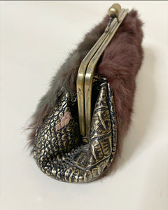 Furry clutch with kiss lock