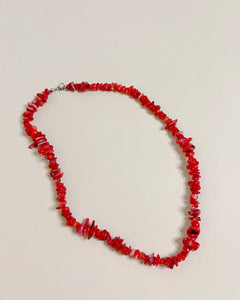 Red puka shell necklace