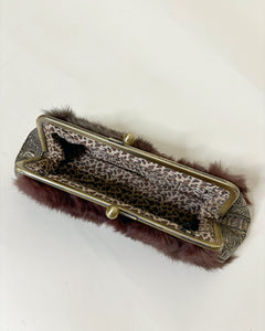 Furry clutch with kiss lock