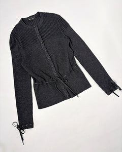 Fitted wool cardigan with leather bows