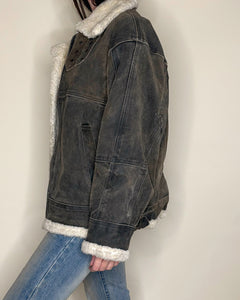 Worn grey shearling jacket