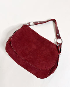 Cherry red studded suede bag