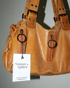 Brown leather buckle bag