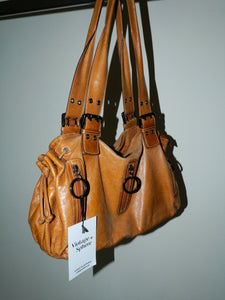 Brown leather buckle bag