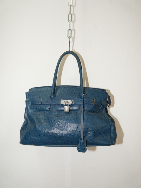 2000's turquoise ostrich firkin bag