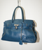 2000's turquoise ostrich firkin bag
