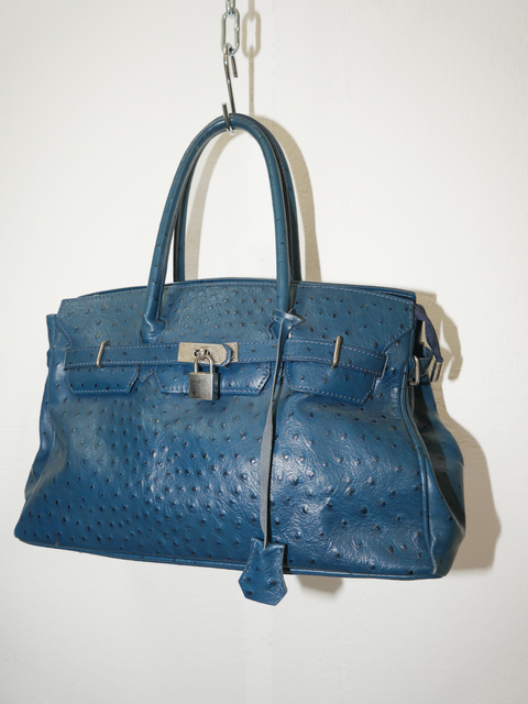 2000's turquoise ostrich firkin bag