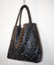 2000's black studded leather hobo bag